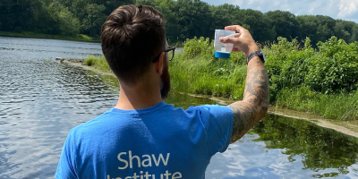 Man holding pfas sample